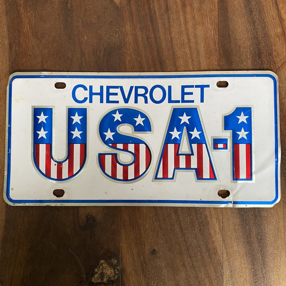 Vintage Chevrolet Chevy Dealer USA 1 Stars Stripes License Plate Embossed Metal